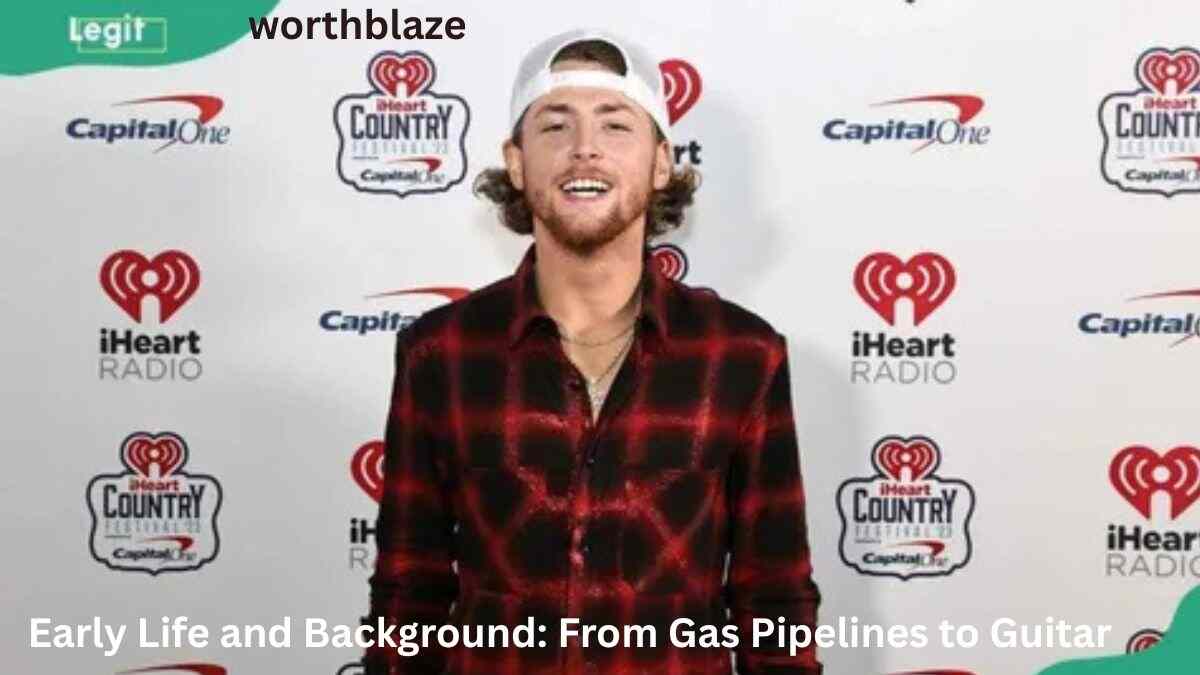 Bailey Zimmerman posing at an iHeartRadio Country event, reflecting his journey from pipeline worker to country music star and the growth of Bailey Zimmerman Net Worth.