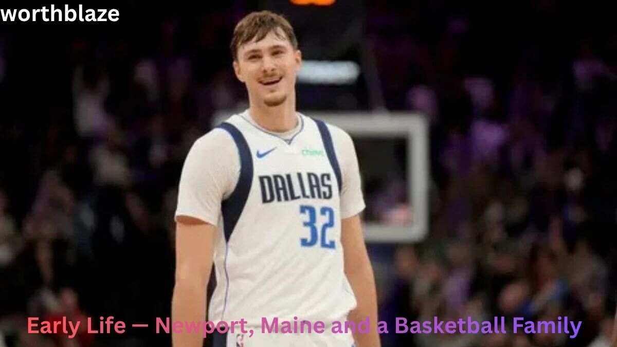 Cooper Flagg smiling in a Dallas basketball jersey during an NBA game, featured in a Cooper Flagg Net Worth article about his early life and career.