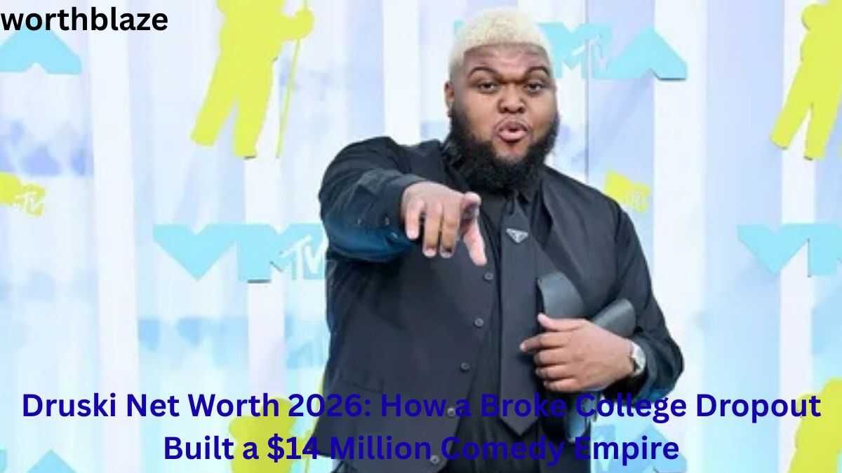 Druski Net Worth 2026 featured image showing comedian and internet personality Druski pointing at the camera during a red carpet event.