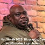 Faizon Love performing stand-up comedy on stage with a microphone, highlighting Faizon Love Net Worth, career earnings, biography, and legal news.