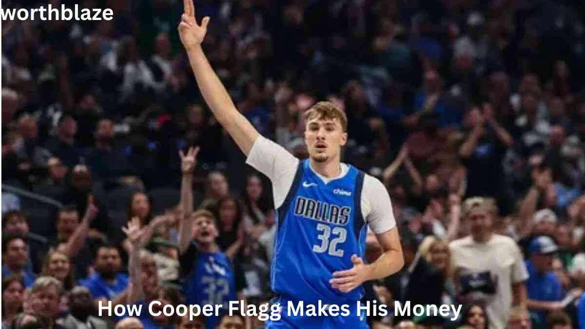 Cooper Flagg waving to fans while wearing a Dallas basketball jersey, featured in a Cooper Flagg Net Worth article about his income sources and NBA success.