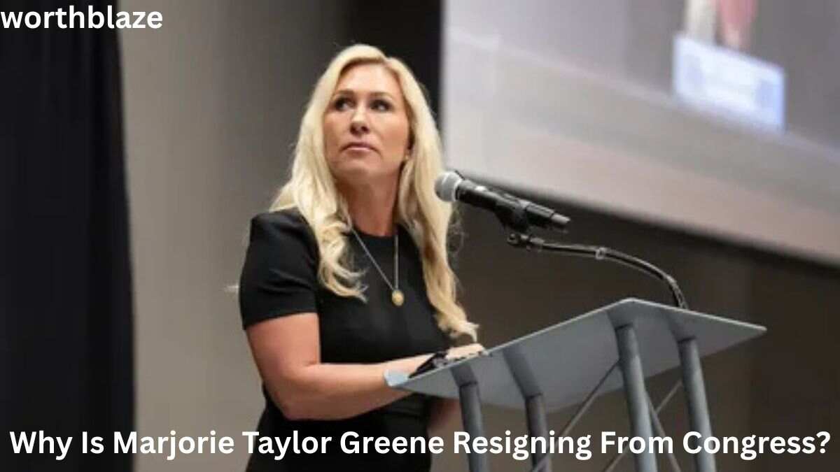 Marjorie Taylor Greene Net Worth — MTG speaking at podium amid resignation news