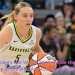 Paige Bueckers dribbling the basketball during a WNBA game – Paige Bueckers Net Worth 2026