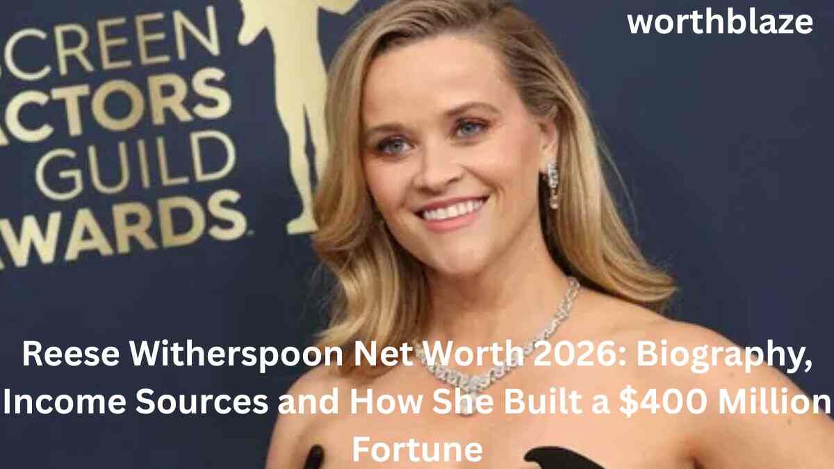 Reese Witherspoon smiling on the red carpet at the Screen Actors Guild Awards, showcasing the success and wealth behind Reese Witherspoon Net Worth.