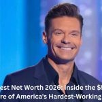 Ryan Seacrest Net Worth – Ryan Seacrest smiling on stage during a television show in 2026