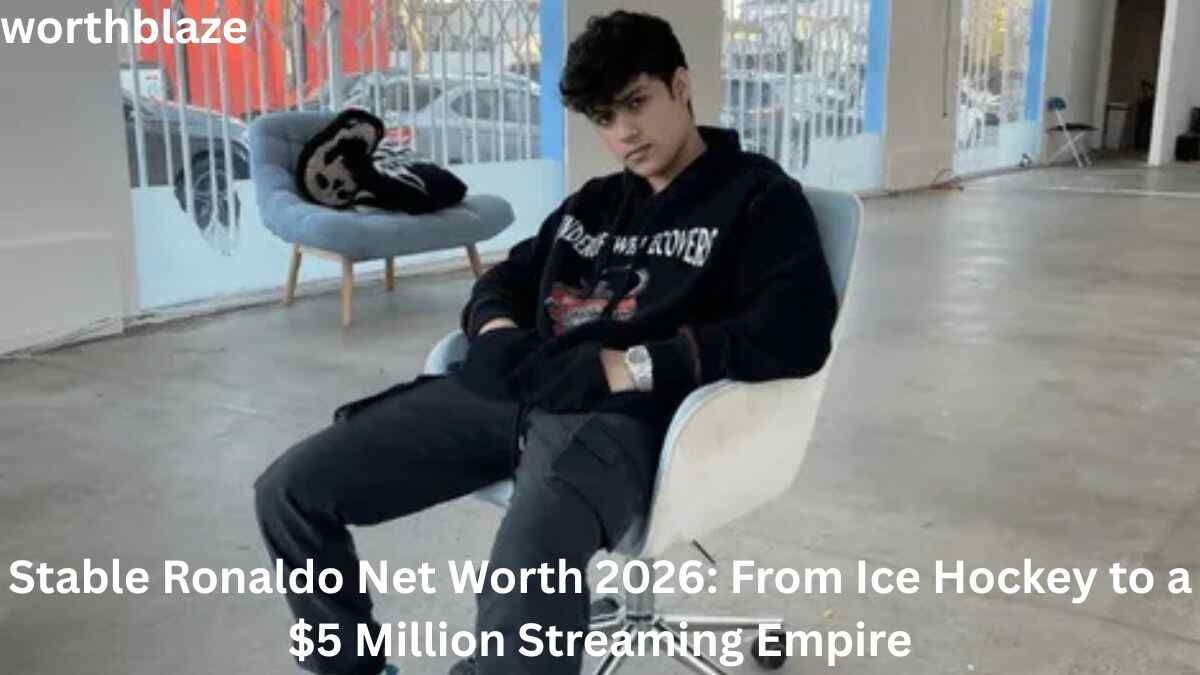 Stable Ronaldo sitting in a modern studio space wearing a black hoodie, featured in an article discussing Stable Ronaldo Net Worth 2026 and his rise to a multimillion-dollar streaming career.