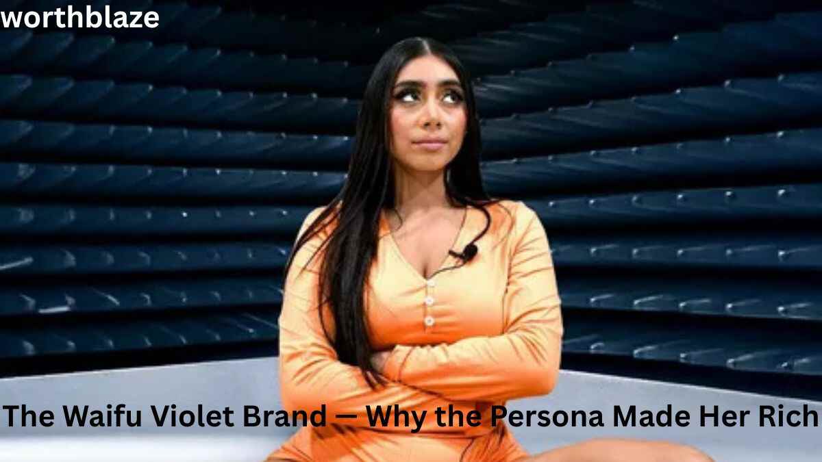 Violet Myers seated in a studio setting, featured in an article discussing the Waifu Violet brand and its impact on Violet Myers net worth.
