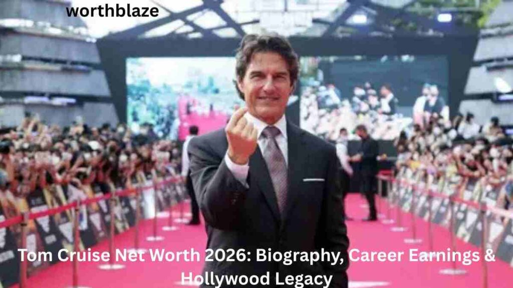 Tom Cruise Net Worth 2026 – Tom Cruise wearing a suit at a Hollywood red carpet event