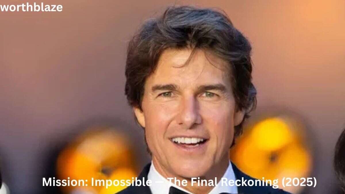 Tom Cruise smiling at a red carpet event during the promotion of Mission: Impossible – The Final Reckoning (2025), highlighting his successful Hollywood career and Tom Cruise Net Worth.