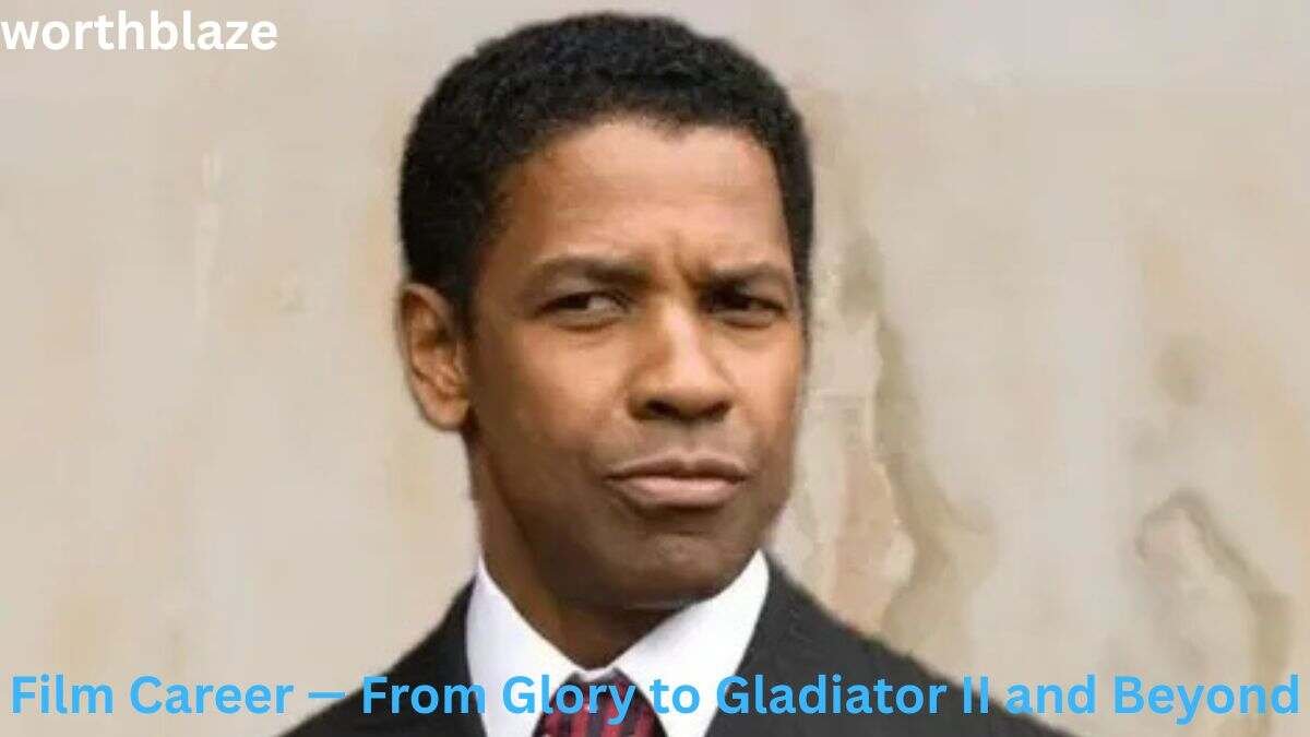 Denzel Washington in a black suit during his film career, featured in an article about Denzel Washington Net Worth.